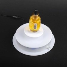 Rotating base for object levitation