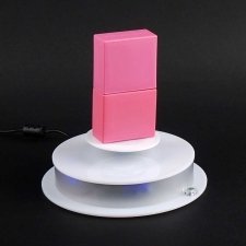 Rotating base for object levitation