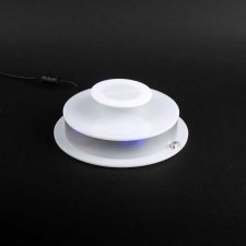 Rotating base for object levitation